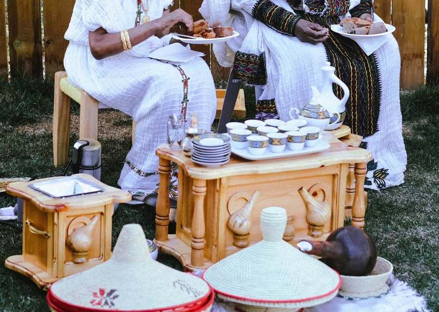 Guests enjoying food beside the coffee set