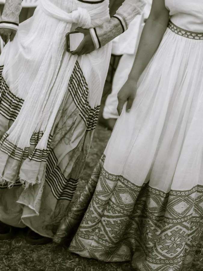 Detail of skirt hems with woven tibeb trim